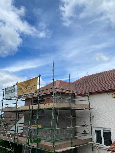 A picture of scaffolding erected by Prestige Roofing, Edinburgh based roofers, in preparation of repairing a roof.