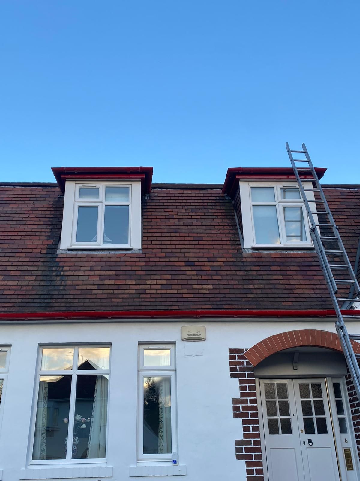 A picture of a pitched roof in Edinburgh with freshly replaced gutters by Prestige Roofing In Edinburgh.